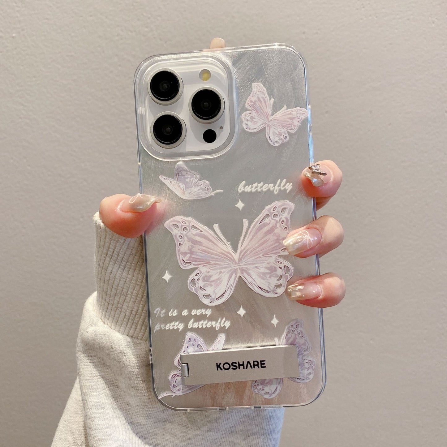 Suitable for iphone15 mobile phone case iphone13 beautiful butterfly invisible bracket feather yarn laser