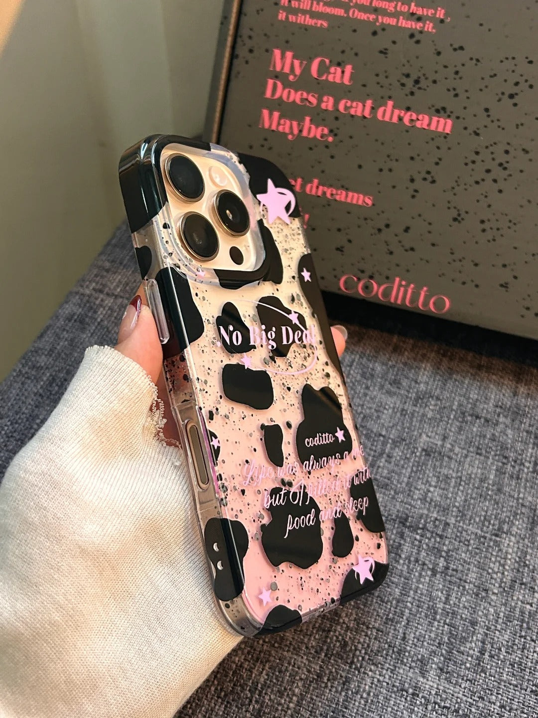The high-value mobile phone case with classic gradient pink design looks good when paired with iPhone 16 Pro Desert Gold