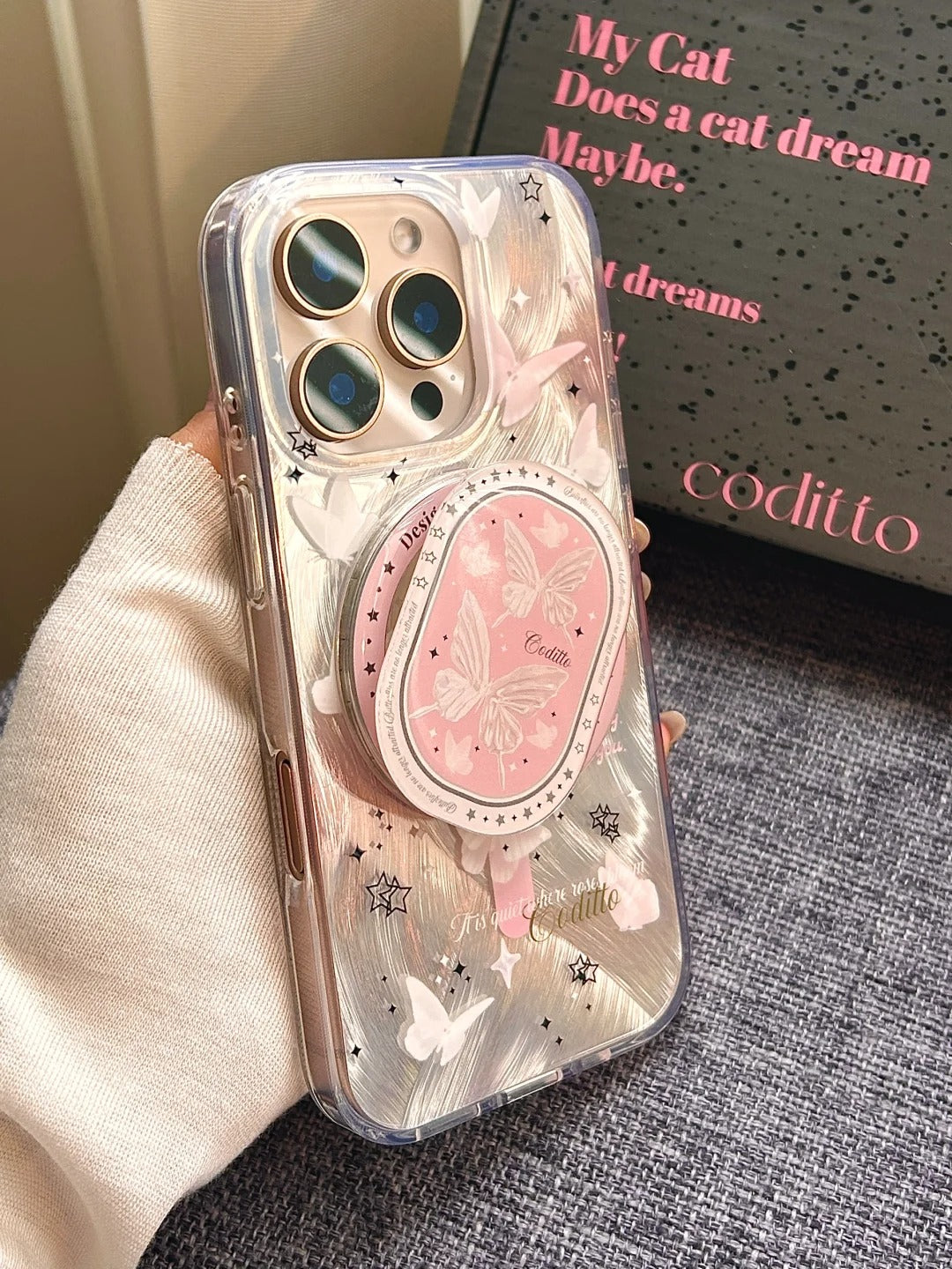 The high-looking and atmospheric butterfly phone case with sparkling shading design matches the iPhone 16 Pro Desert Gold