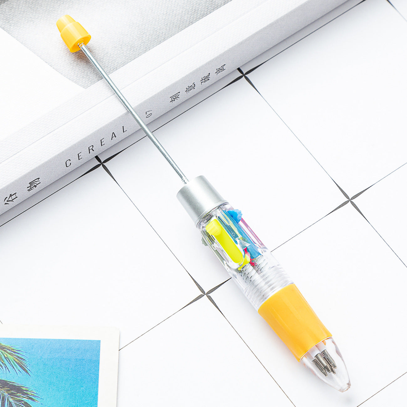 Four-color beaded pen